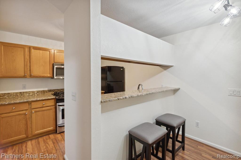 620 Curzon Court, 103, Howell, MI 48843 — Photo 17