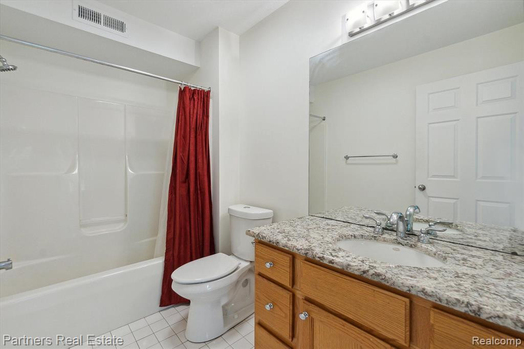 620 Curzon Court, 103, Howell, MI 48843 — Photo 24