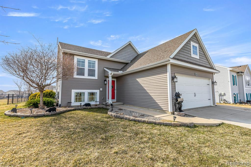 3735 AMBER OAKS Drive, Howell, MI 48855 — front exterior