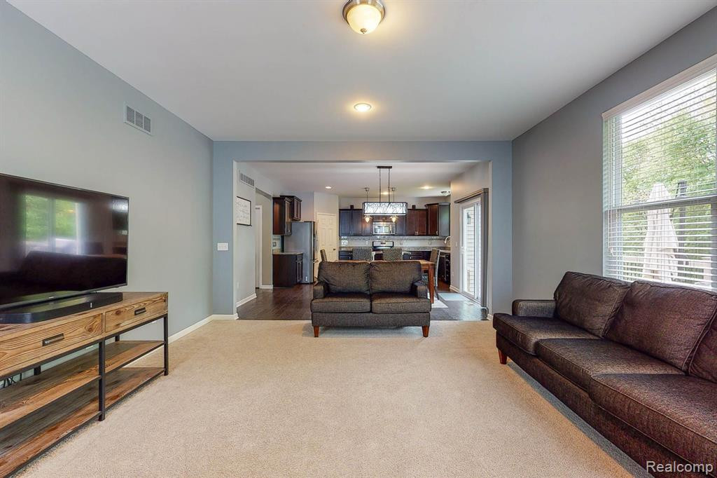 58097 SUNFLOWER Circle S, New Hudson, MI 48165 — Photo 16