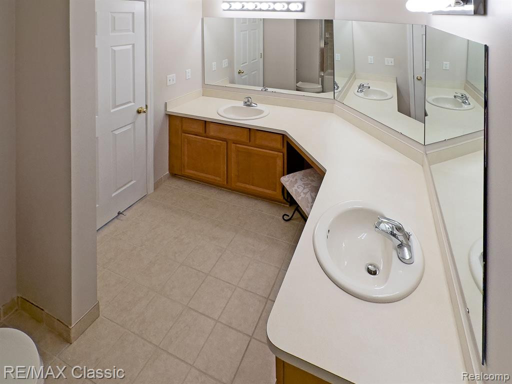 30201 CHANTEL Drive, Commerce Twp, MI 48390 — Photo 18