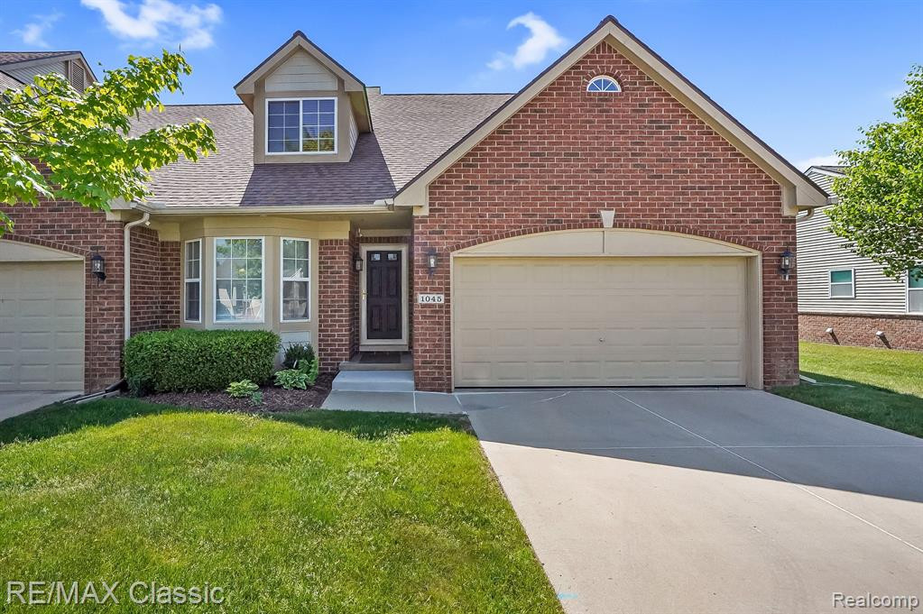 1045 PADDOCK Drive, South Lyon, MI 48178 — front exterior