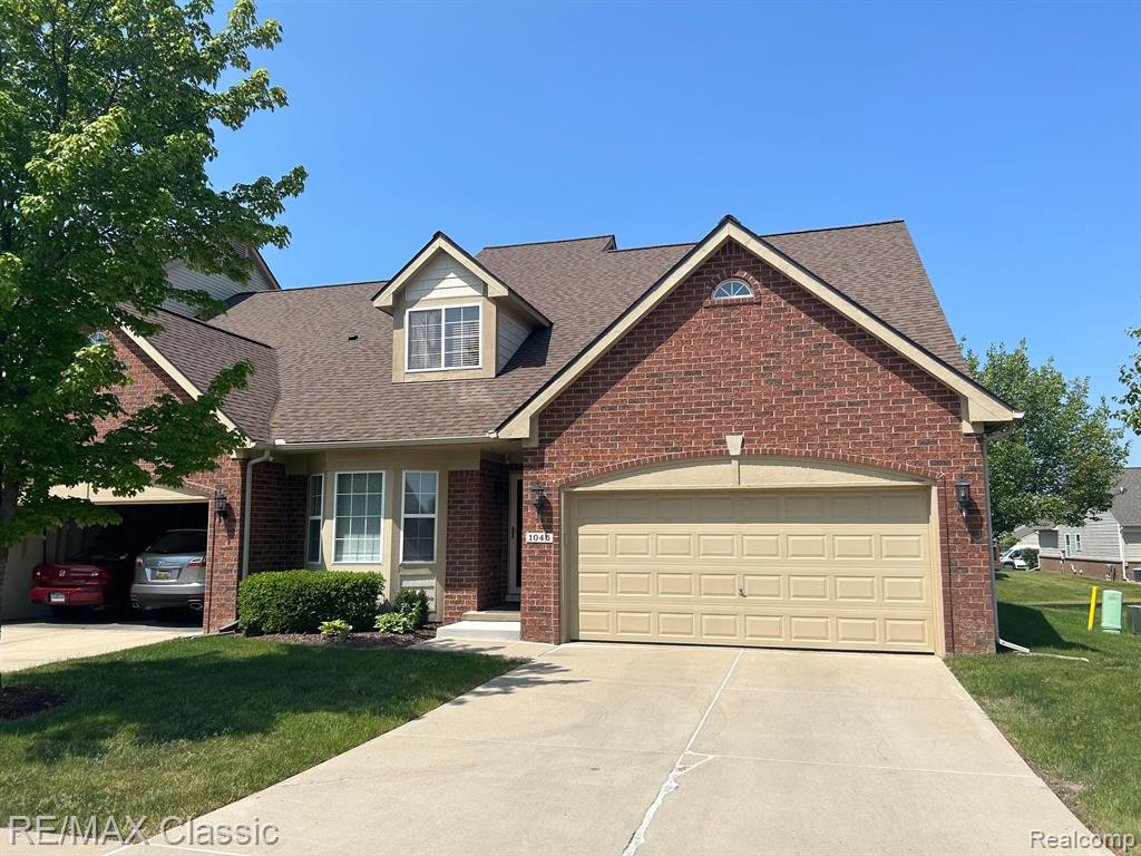 1045 PADDOCK Drive, South Lyon, MI 48178 — Photo 2