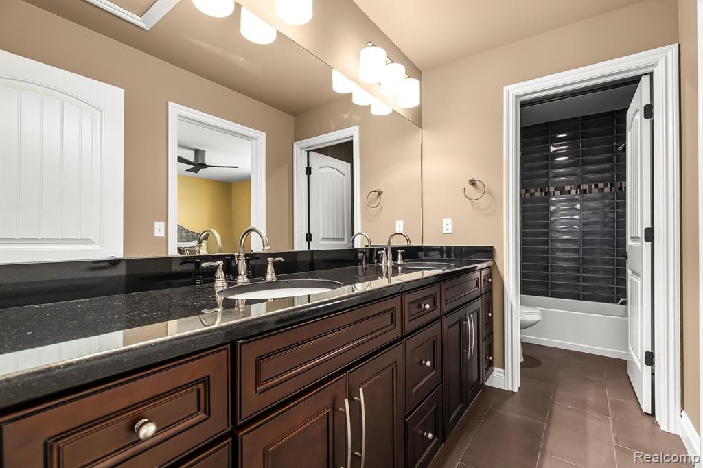 10744 WATERFALL Court, South Lyon, MI 48178 — Photo 26