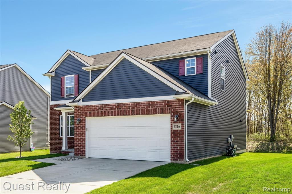 1216 CANNONADE Loop, Howell, MI 48843 — front exterior
