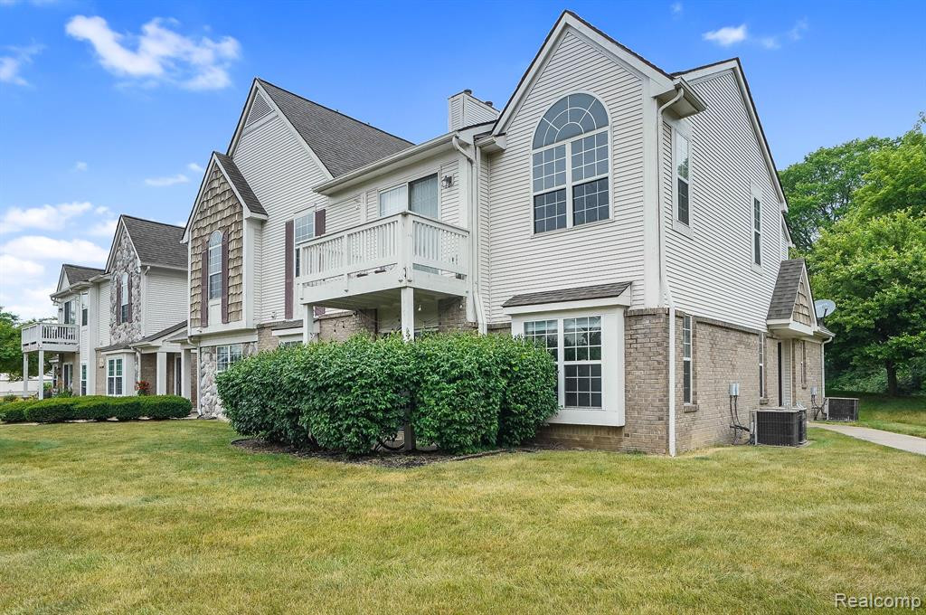 228 BROOKWOOD Drive, 6, South Lyon, MI 48178 — front exterior