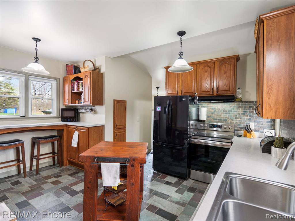 306 E ELMWOOD, Leonard, MI 48367 — Photo 18