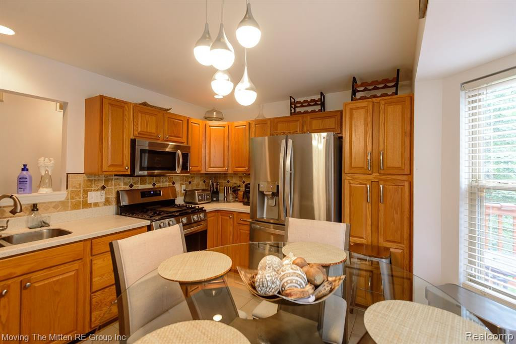 8743 HARDWOOD Drive, Unit #103, Belleville, MI 48111 — Photo 11