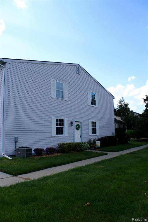 290 LAKE VILLAGE Drive, Walled Lake, MI 48390 — Photo 2