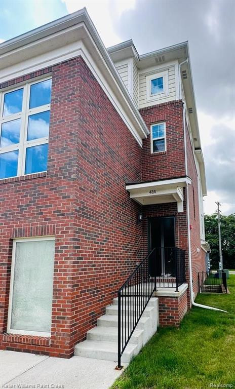 414 LEGATO Drive, Walled Lake, MI 48390 — front exterior