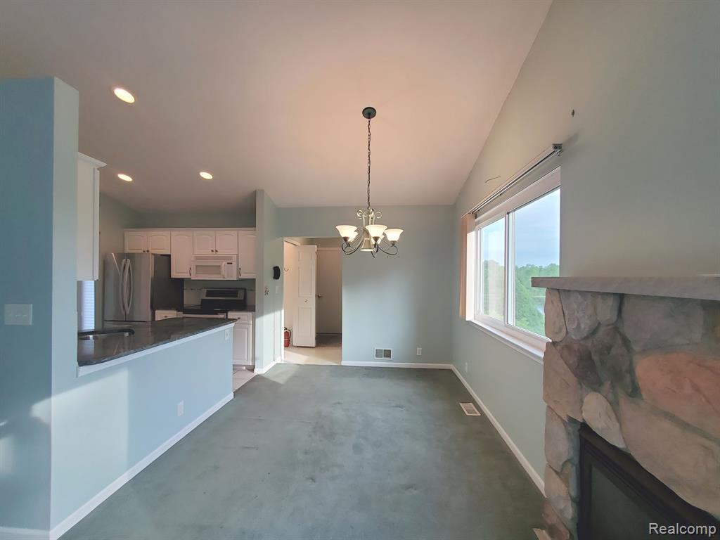 7299 Hawthorne Circle, Goodrich Vlg, MI — Photo 9