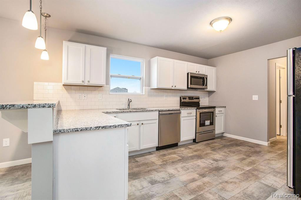 3075 IVY WOOD Circle, Howell, MI 48855 — Photo 7