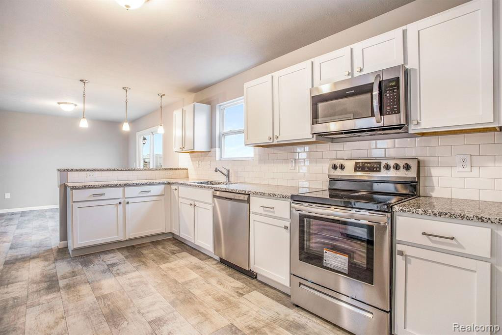 3075 IVY WOOD Circle, Howell, MI 48855 — Photo 8