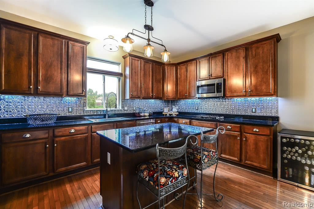 130 SINGH Boulevard, South Lyon, MI 48178 — Photo 5