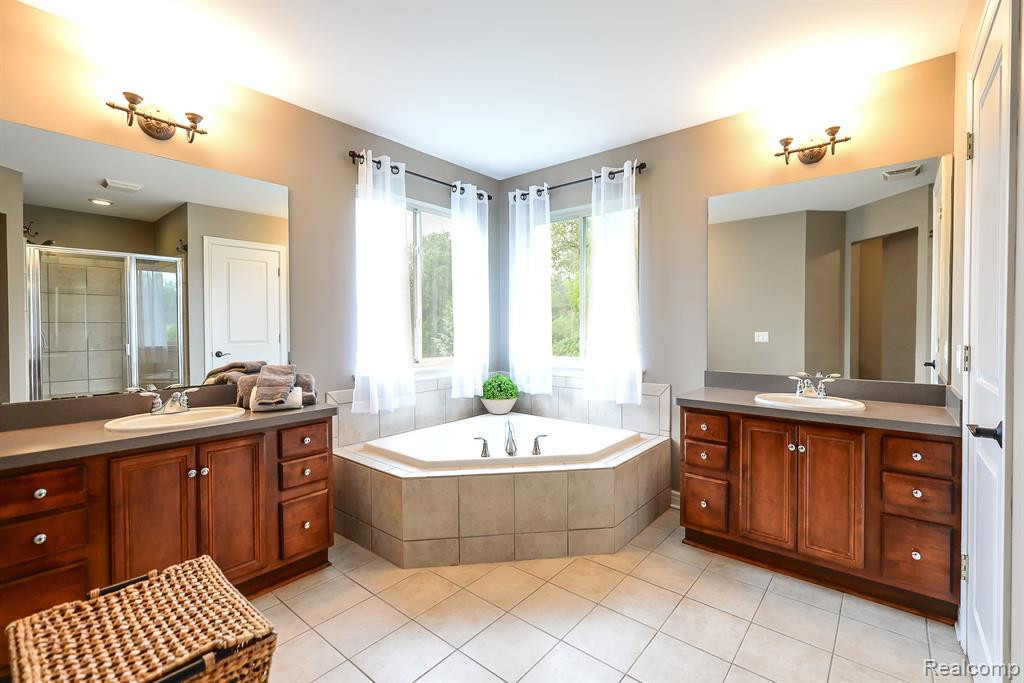 130 SINGH Boulevard, South Lyon, MI 48178 — Photo 20