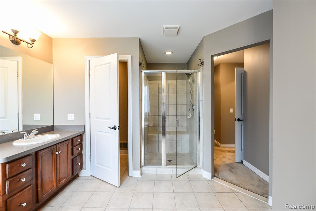 130 SINGH Boulevard, South Lyon, MI 48178 — Photo 21