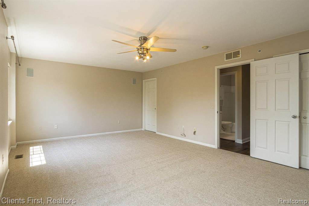 161 E BAY Drive, Walled Lake, MI 48390 — Photo 27