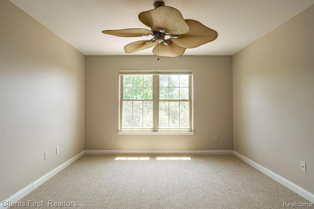 161 E BAY Drive, Walled Lake, MI 48390 — Photo 35