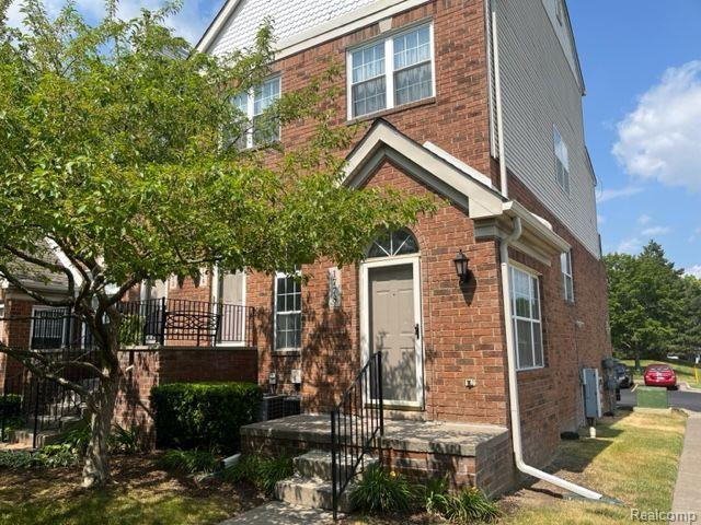 1778 CAMPAU FARMS Circle, 53-15, Detroit, MI 48207 — front exterior