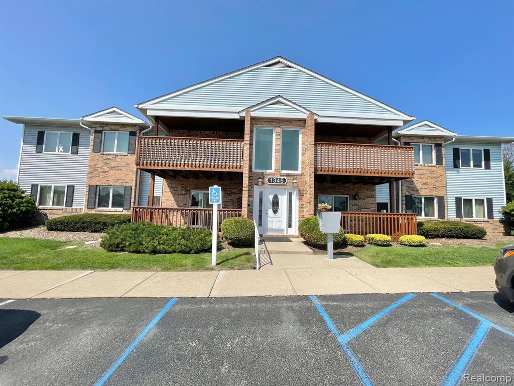 1345 HARBOUR Boulevard, 99, Trenton, MI 48183 — front exterior