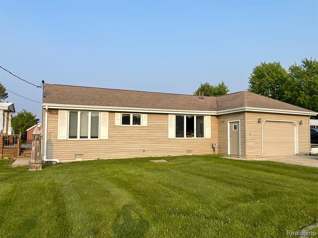 8574 LARNED Road, Port Austin, MI 48467 — front exterior
