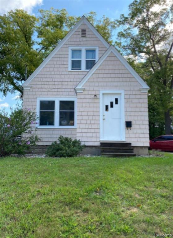 556 N HAGADORN Road, East Lansing, MI 48823 — front exterior
