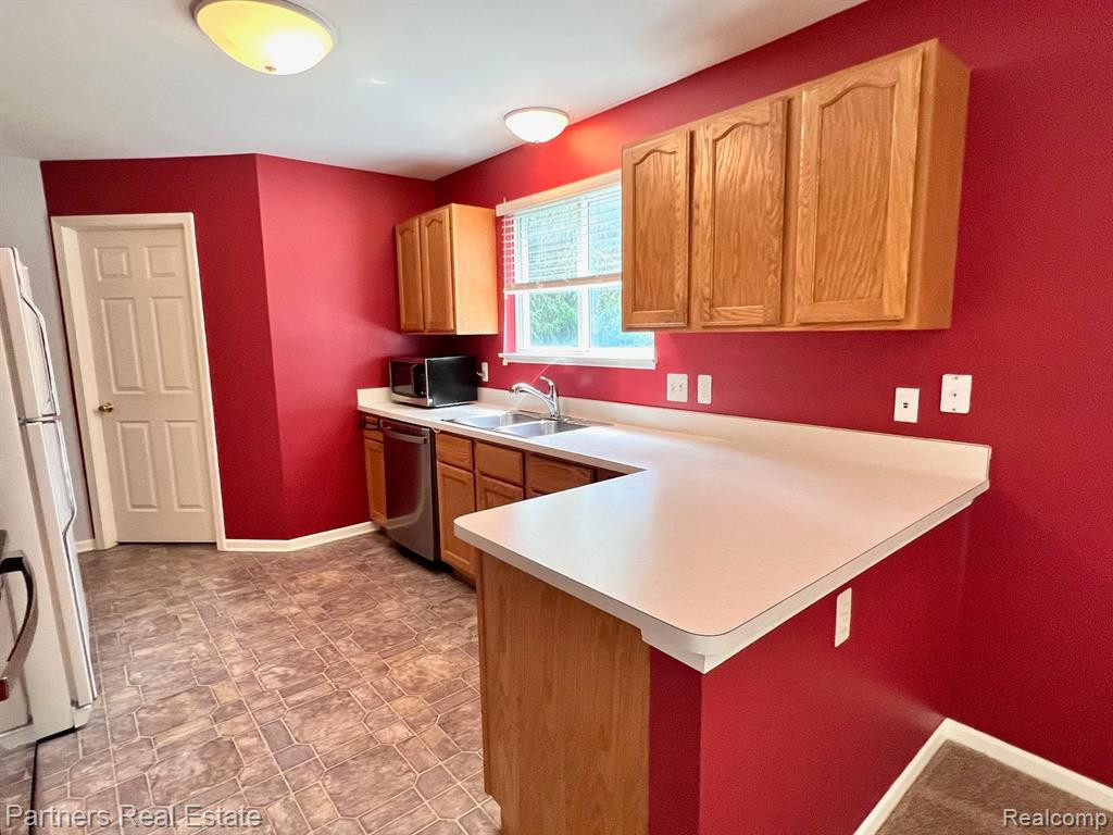 347 WOODFIELD SQUARE Lane, 106, Brighton, MI 48116 — Photo 19