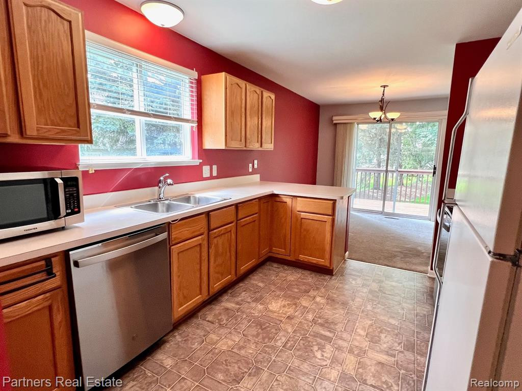 347 WOODFIELD SQUARE Lane, 106, Brighton, MI 48116 — Photo 20