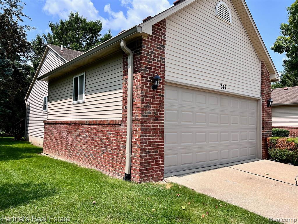 347 WOODFIELD SQUARE Lane, 106, Brighton, MI 48116 — Photo 28