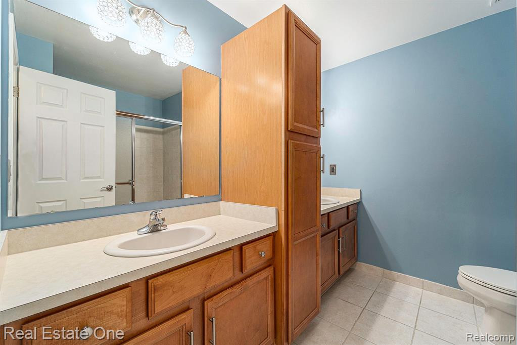 27104 CHANTEL Drive, 243, Walled Lake, MI 48390 — Photo 16