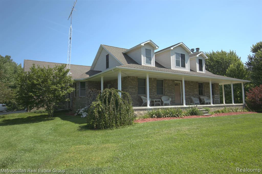 11286 DUNNIGAN Road, Emmett, MI 48022 — front exterior