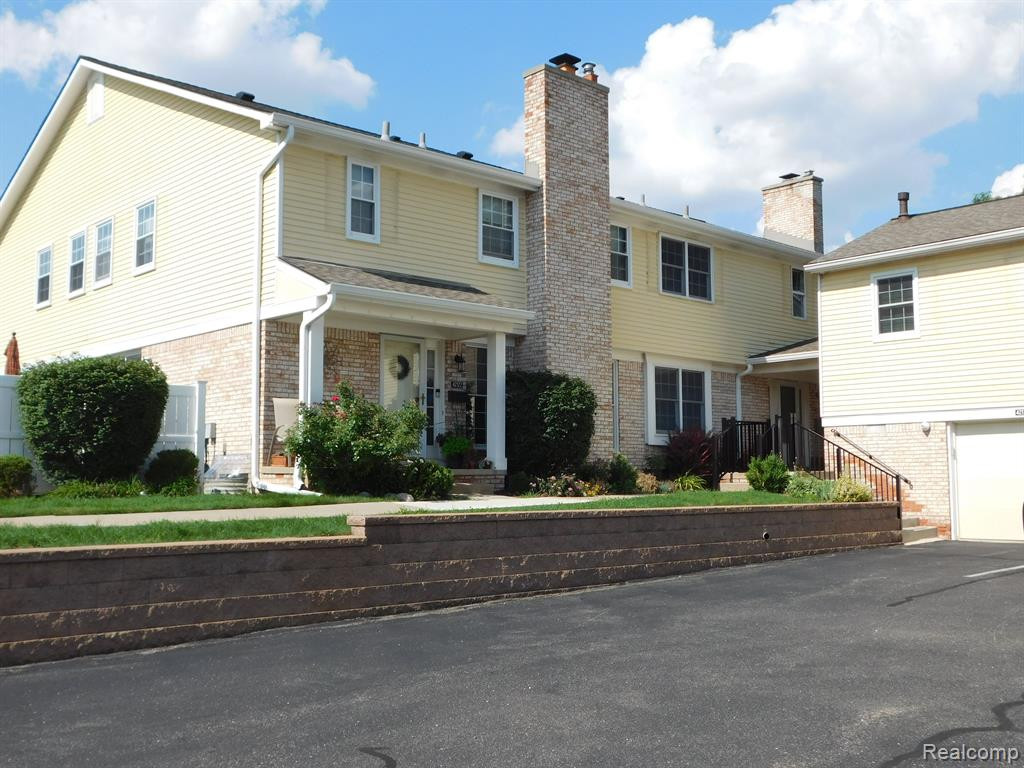 42128 GLADWIN Street, 384, Northville, MI 48167 — front exterior
