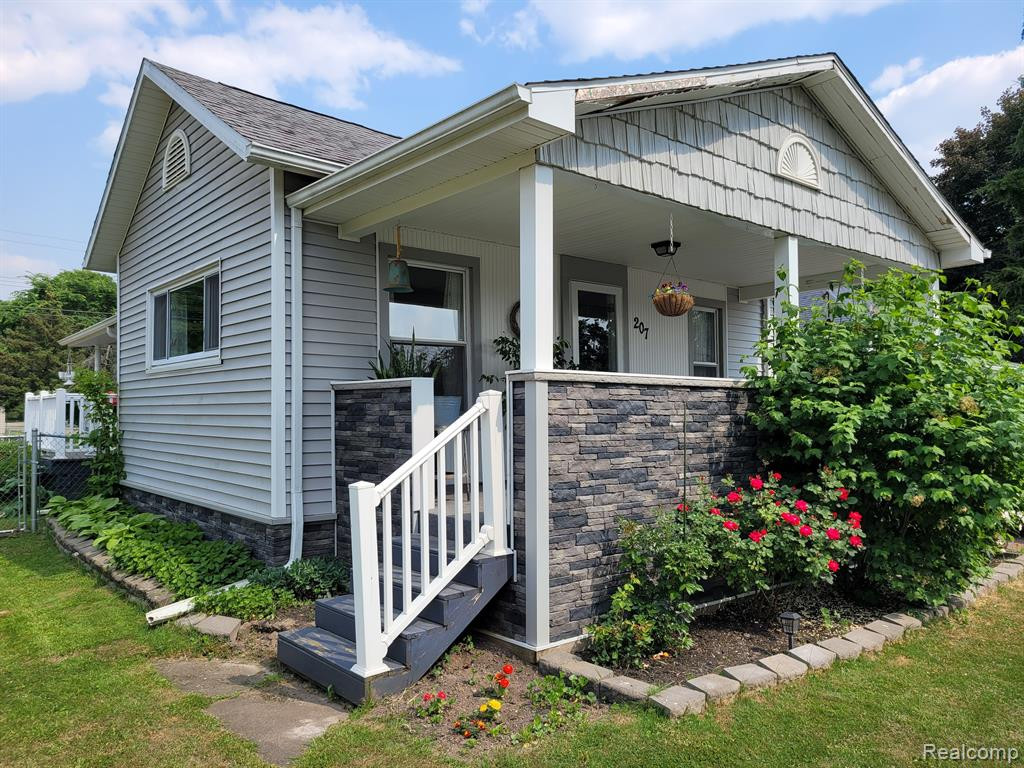 207 S MAPLE Street, Webberville, MI 48892 — front exterior