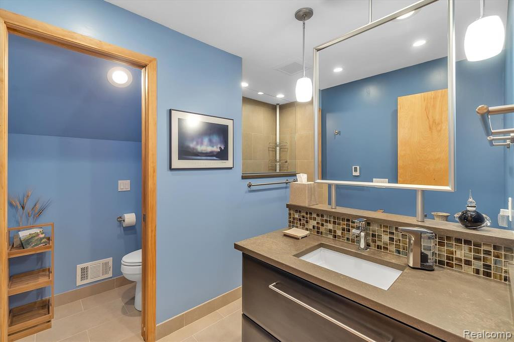 21222 E CHIGWIDDEN Street, Northville, MI 48167 — Photo 49