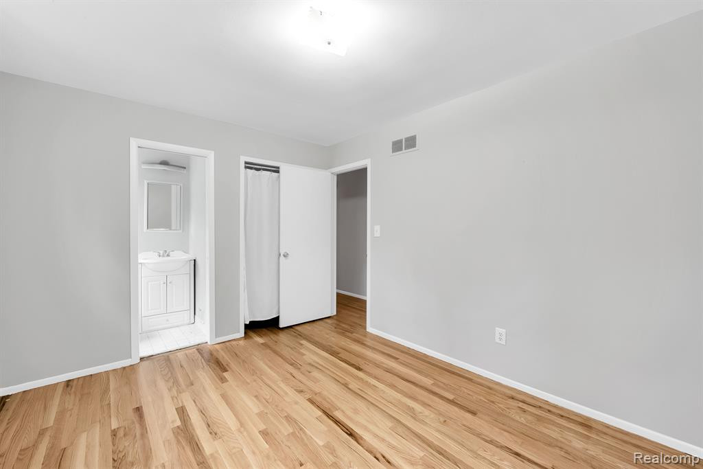 525 WOLVERINE Drive E, Wolverine Lake, MI 48390 — Photo 13