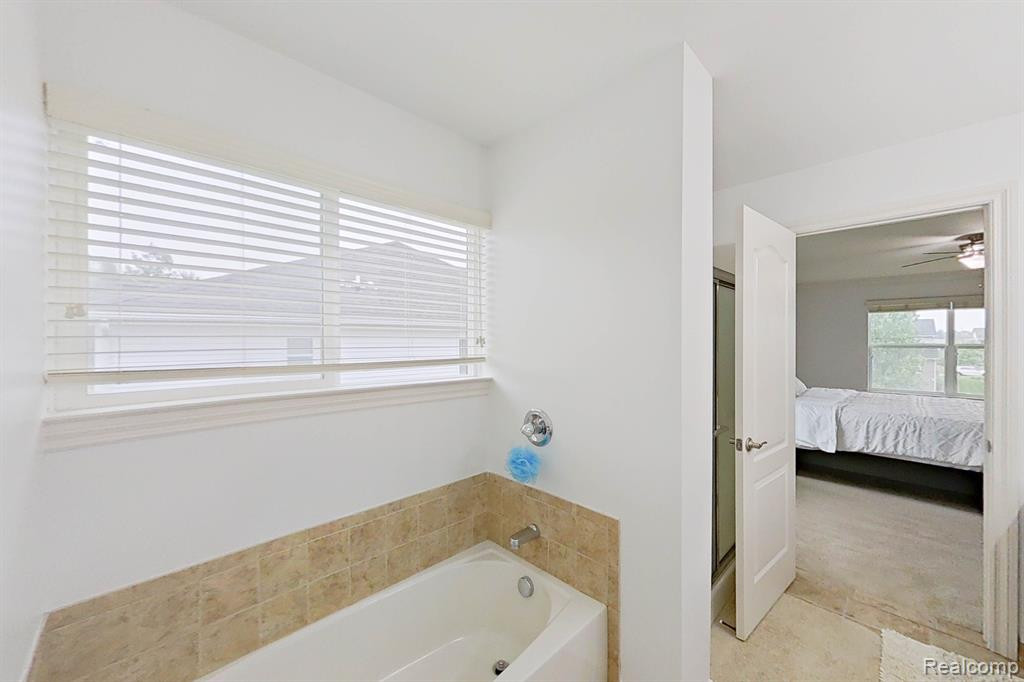 53753 SPRINGWOOD Drive, South Lyon, MI 48178 — Photo 30