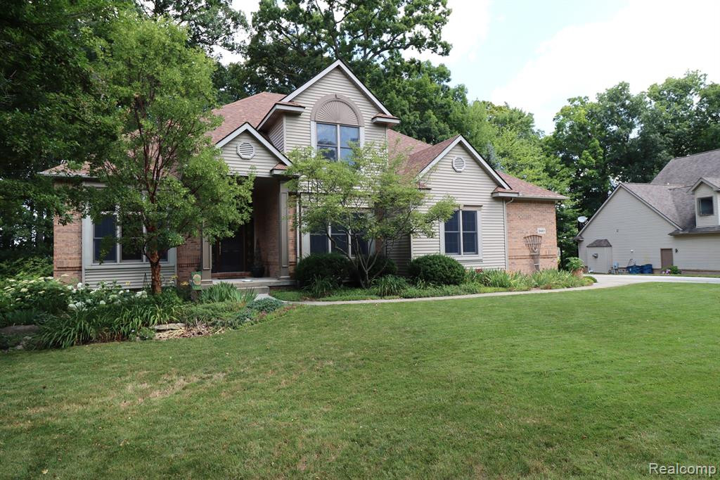 9441 Fair Oaks Drive, Goodrich Vlg, MI — front exterior