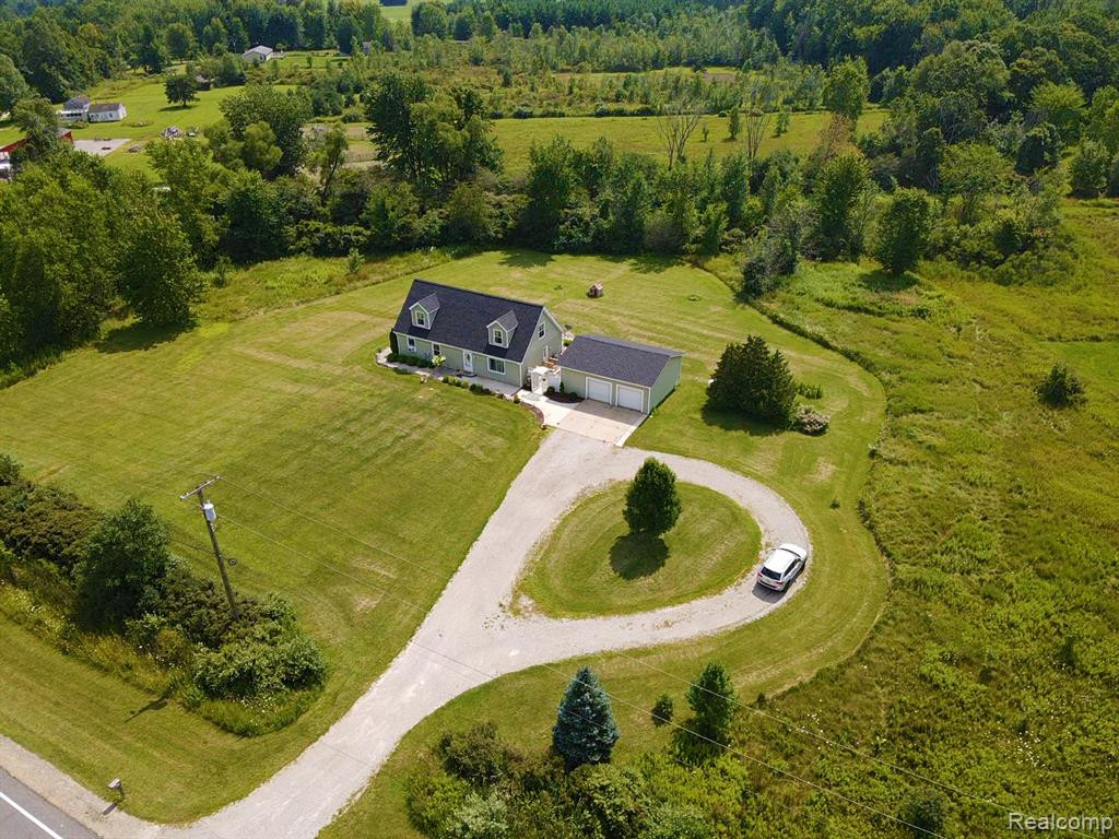 11511 DUNNIGAN Road, Emmett, MI 48022 — front exterior