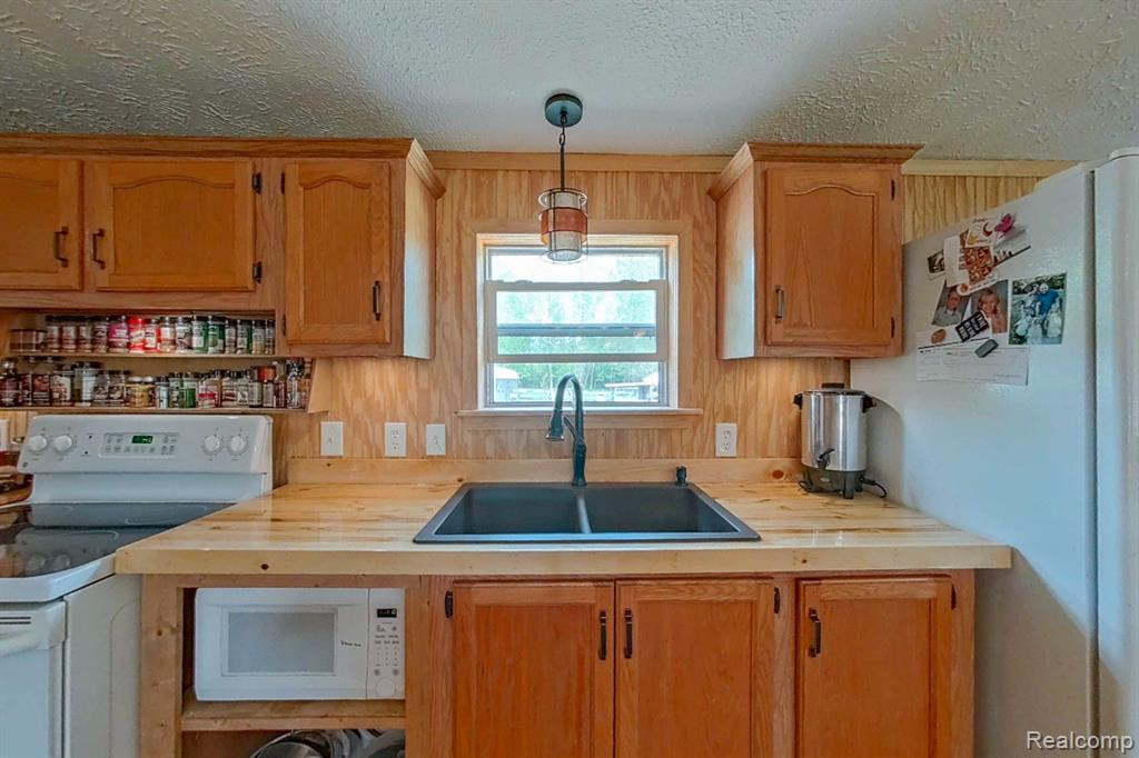 49 ELMWOOD Road, Fostoria, MI 48435 — Photo 43
