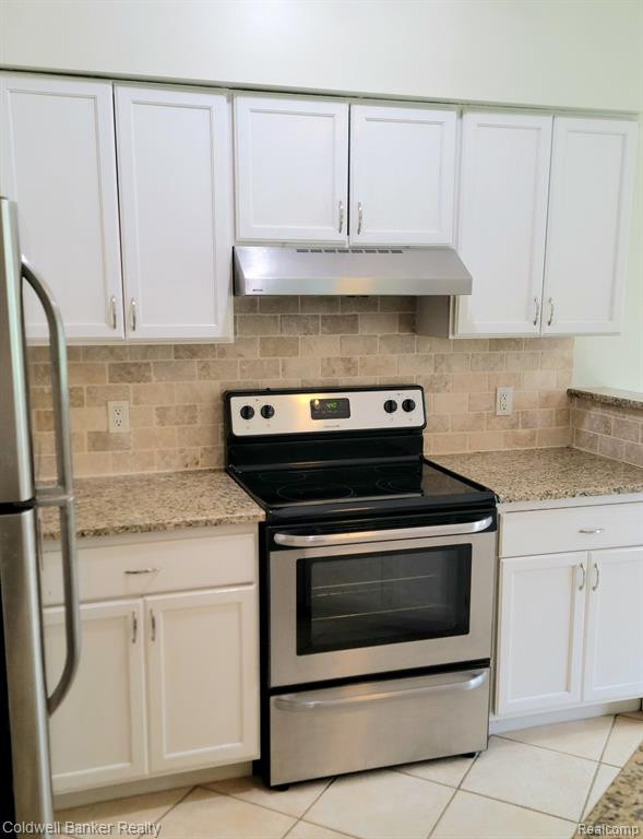 405 WATER TOWER Circle, Brighton, MI 48116 — Photo 18