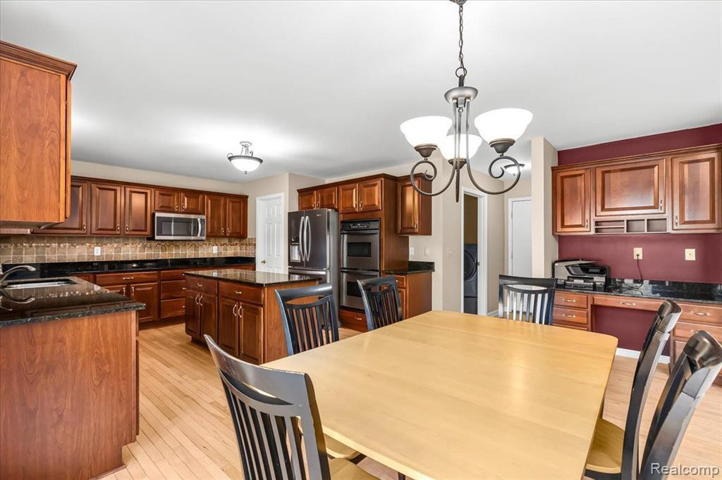7136 N MEADOWS Trail, Dexter, MI 48130 — Photo 17