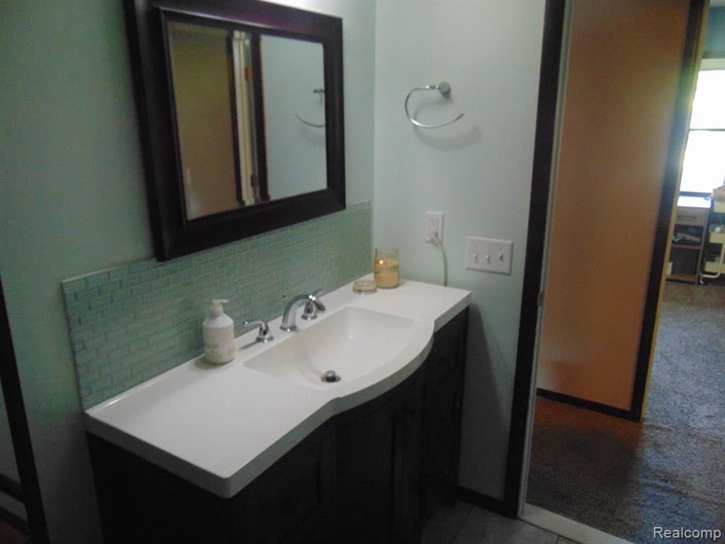 2352 WOODLAWN Street, Wolverine Lake, MI 48390 — Photo 16