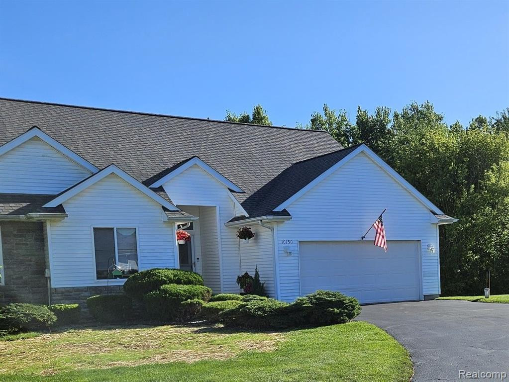 10150 Hawthorne Ridge Road, Goodrich Vlg, MI — front exterior