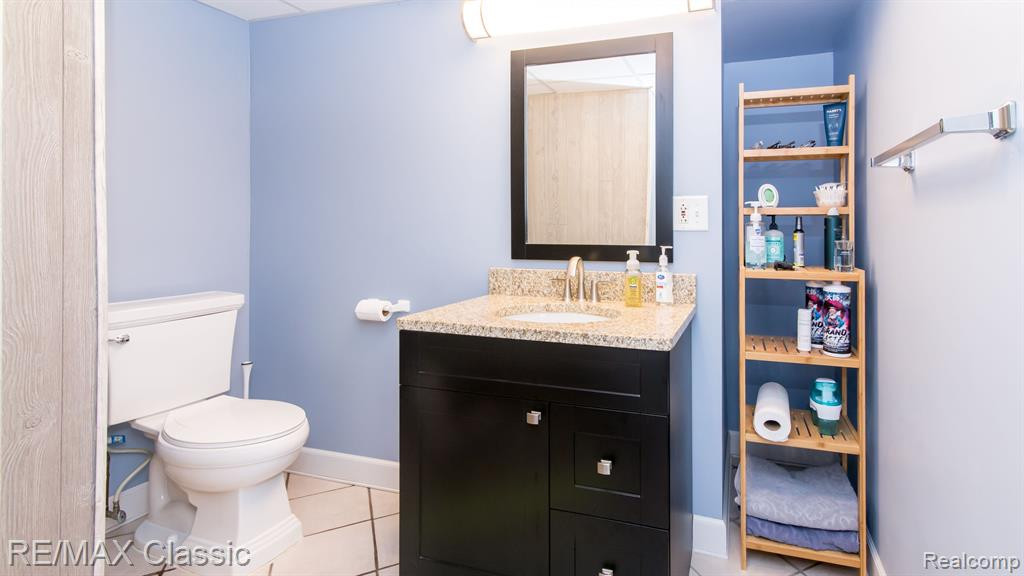 2552 WOODLAWN Street, Wolverine Lake, MI 48390 — Photo 26