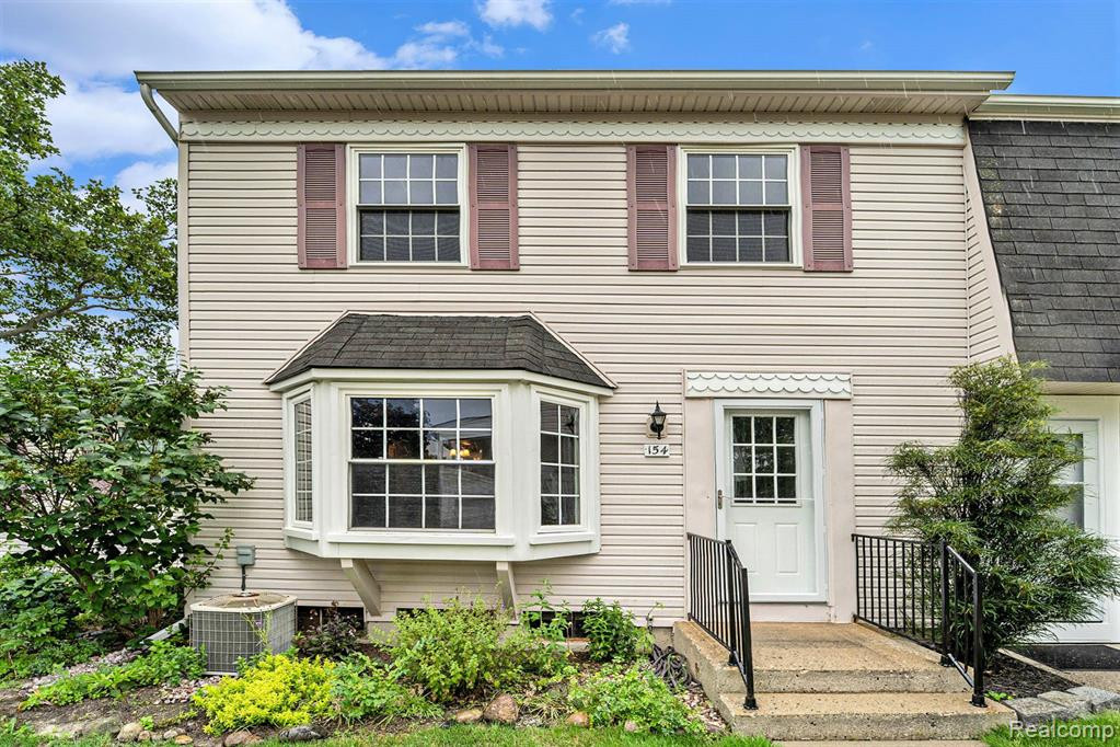 154 NEPTUNE Drive, #54, Walled Lake, MI 48390 — front exterior