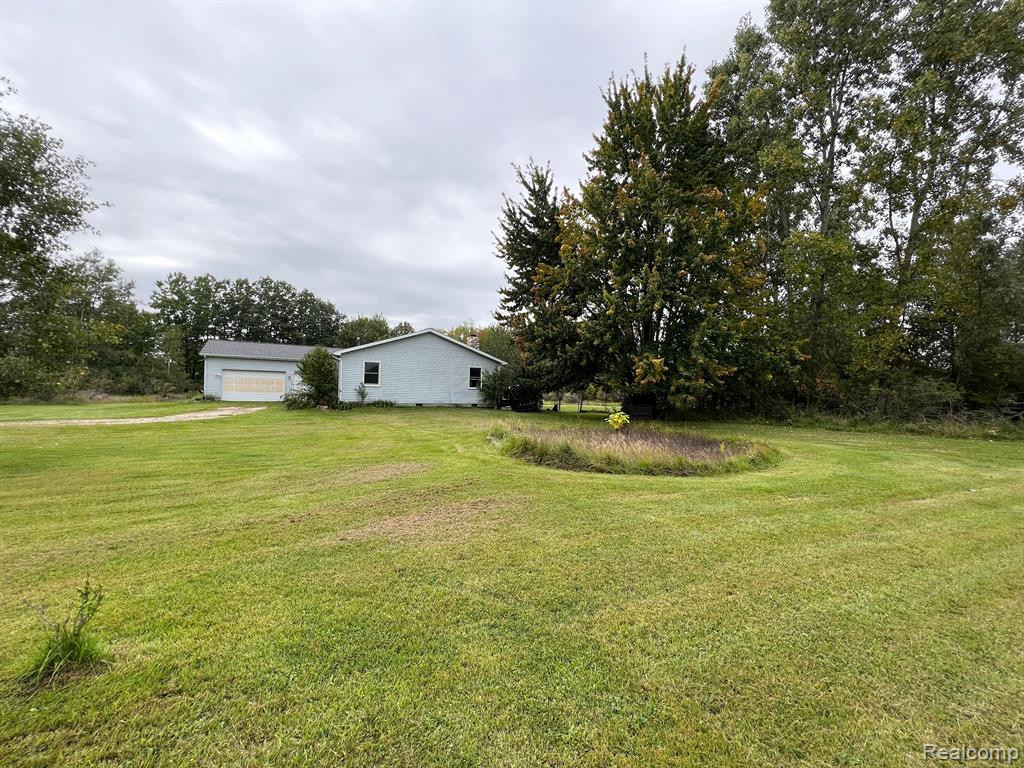 9860 OATMAN Road, Greenwood, MI 48006 — Photo 39