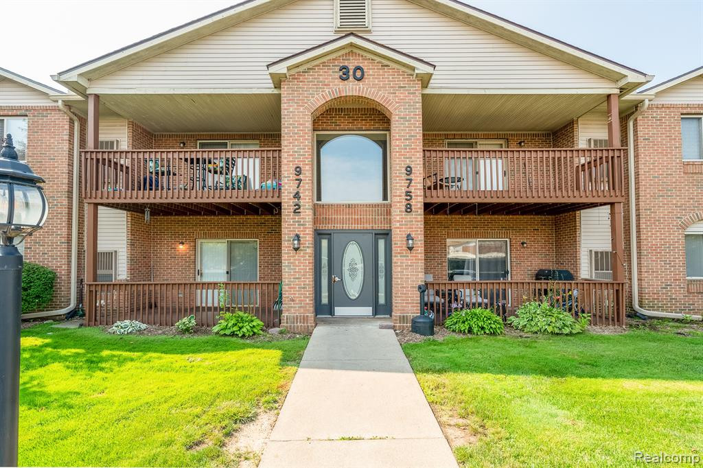 9754 SAWGRASS Court, Belleville, MI 48111 — front exterior
