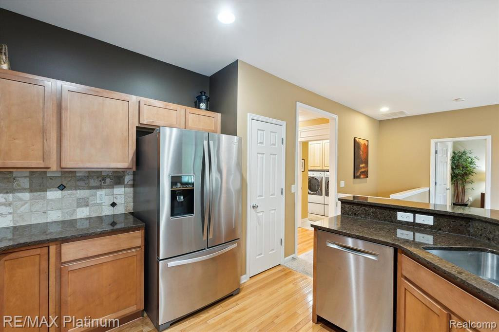 3730 RAINIER Drive, 109, Howell, MI 48843 — Photo 11