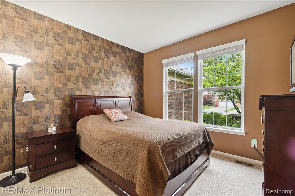 3730 RAINIER Drive, 109, Howell, MI 48843 — Photo 13