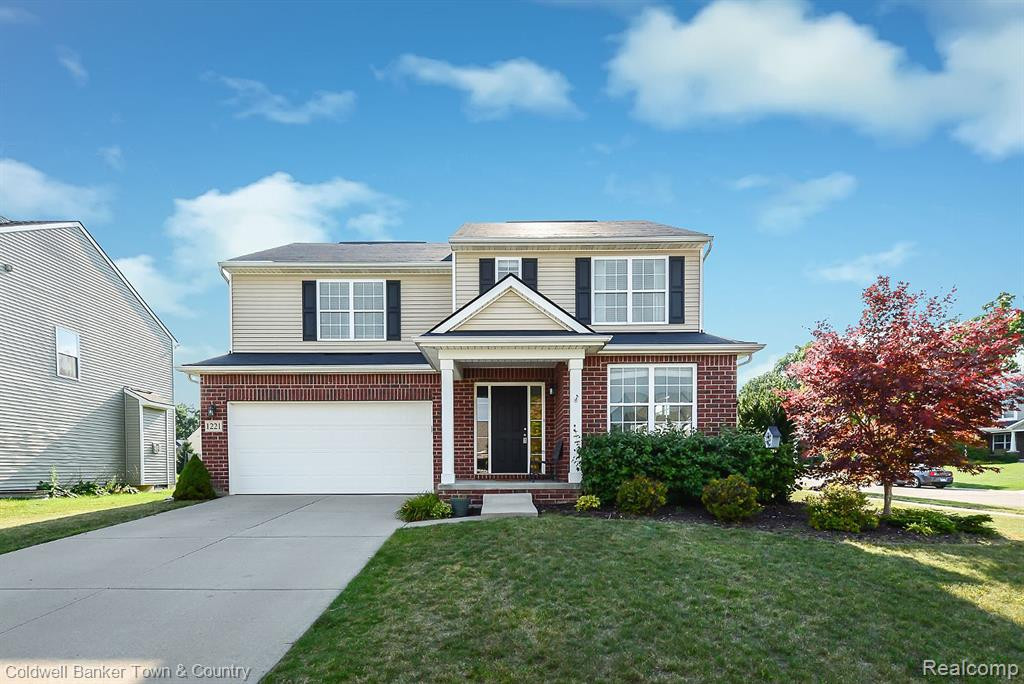 1221 SECRETARIAT Way, Howell, MI 48843 — front exterior